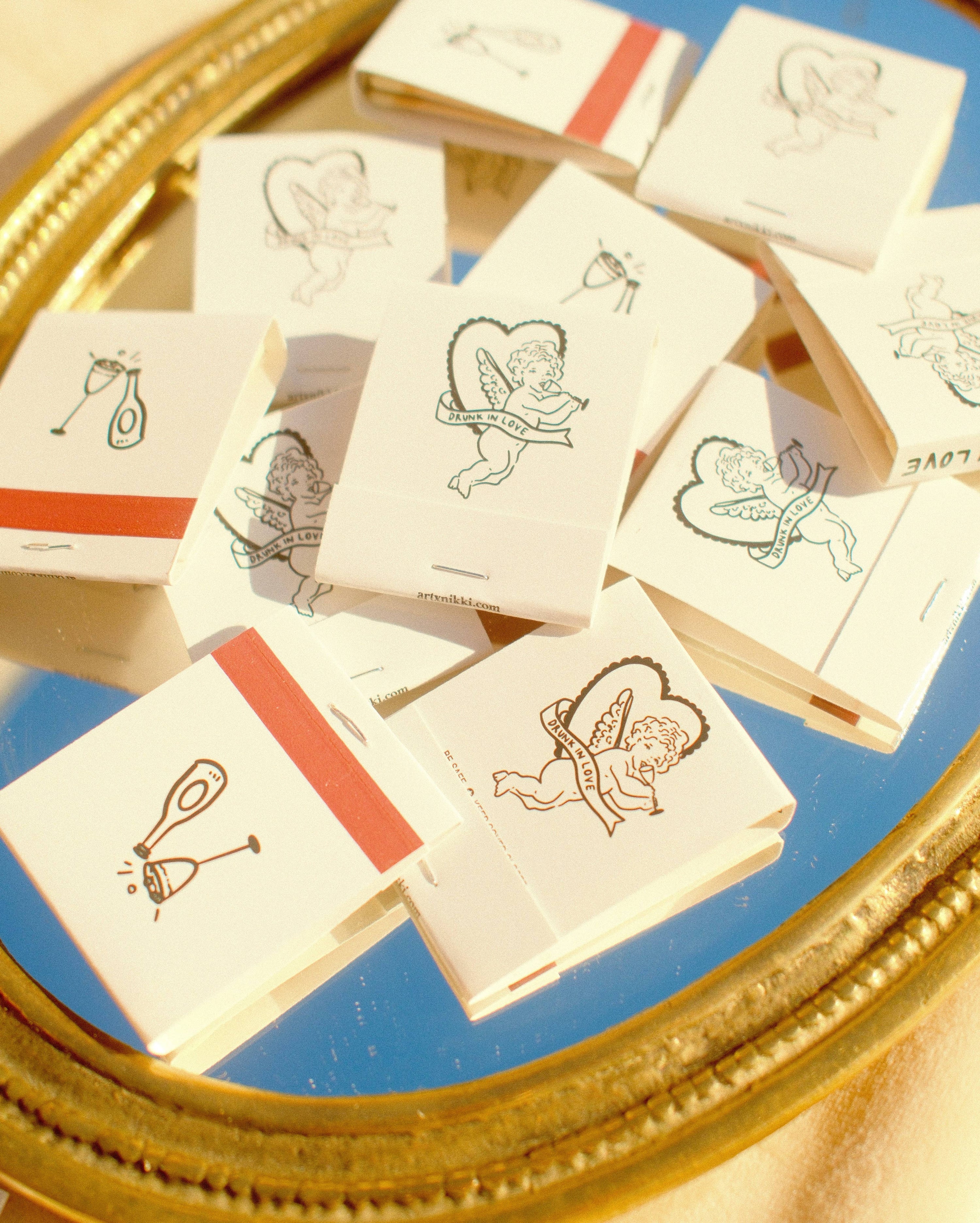 “Drunk In Love” Cupid Champagne Matchbook