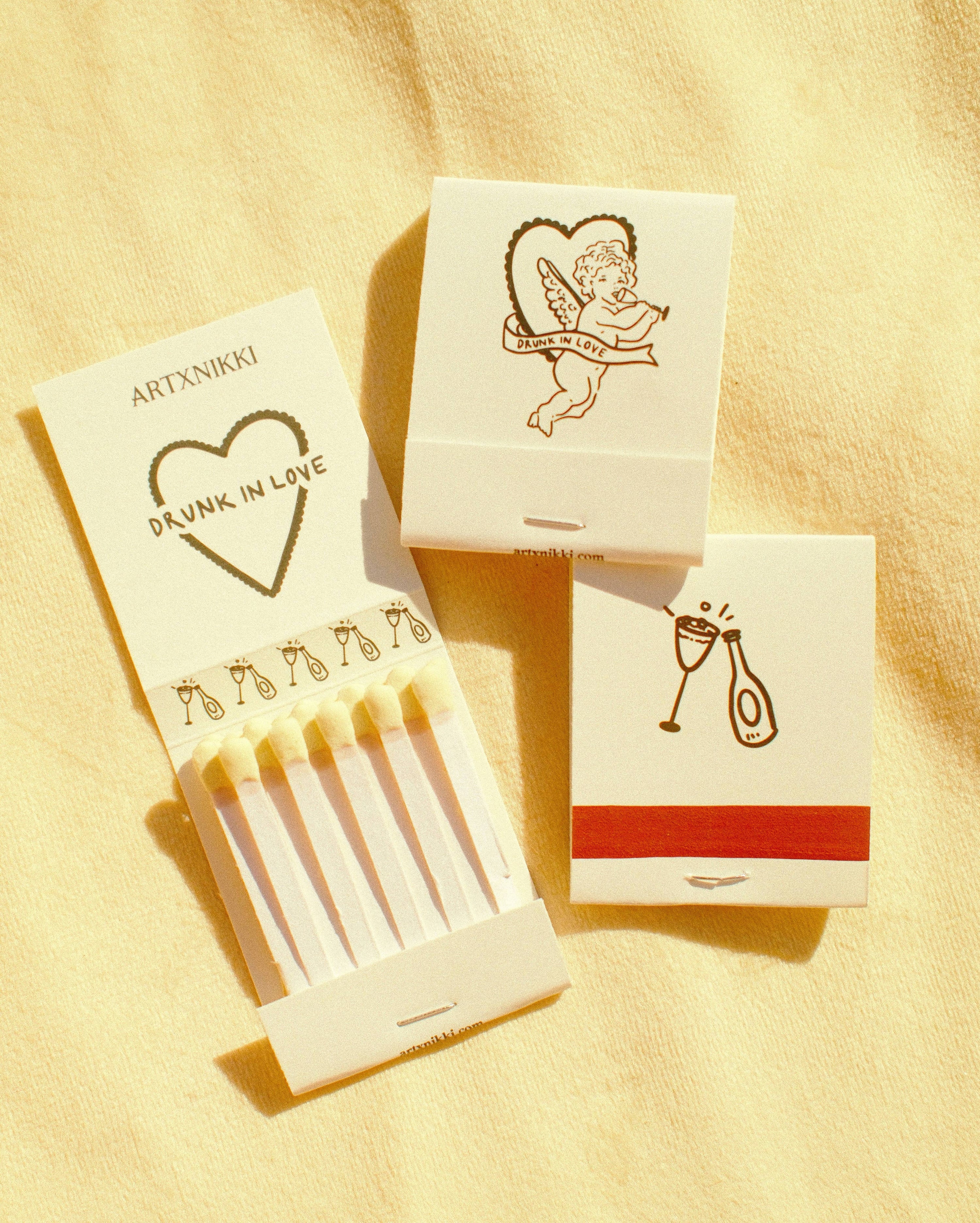 “Drunk In Love” Cupid Champagne Matchbook