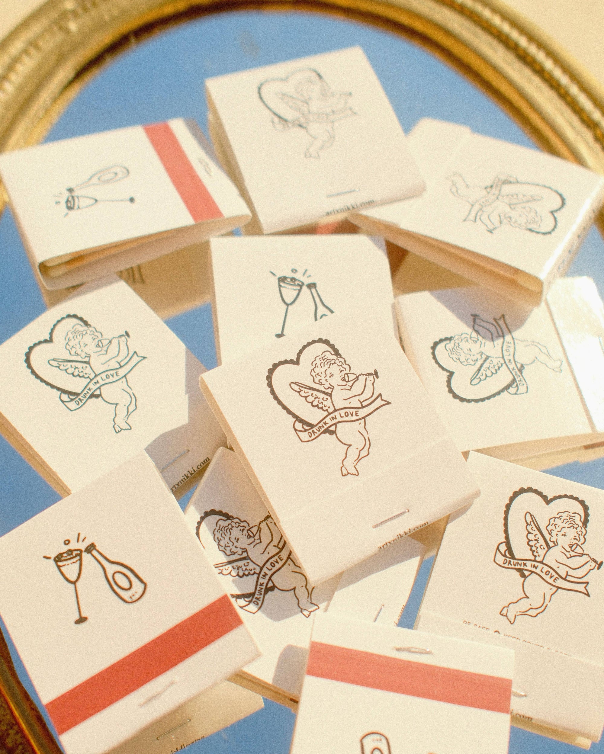 “Drunk In Love” Cupid Champagne Matchbook